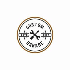 circle vintage badge hipster garage logo with crossed wrench and screwdriver icon illustration