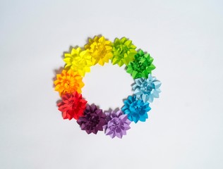 Flower made of paper. Rainbow color.