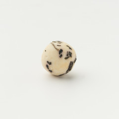 Salty dry kurt with basil. National sour milk product of Central Asia