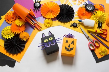 Halloween holiday black cat made of paper.