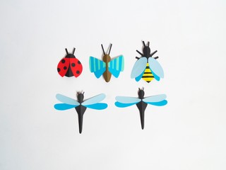 Insect made of paper craft. Material and tool for creativity.