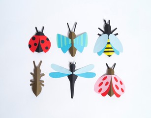 Insect made of paper craft. Material and tool for creativity.