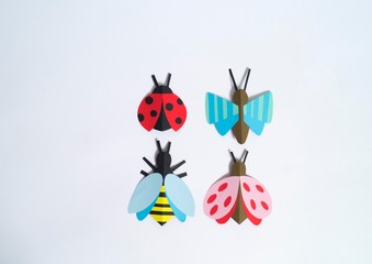 Insect made of paper craft. Material and tool for creativity.