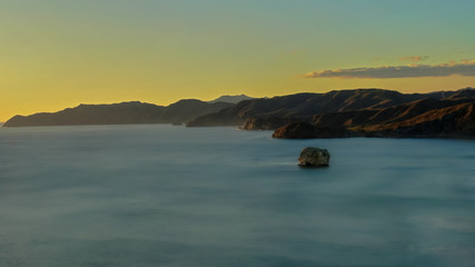 Beautiful aerial view of a sunset in  Naranjo Beach - Witch Rock Costa Rica