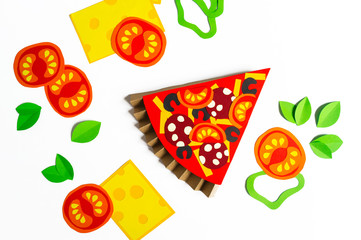 Pizza made of paper. Fast food.