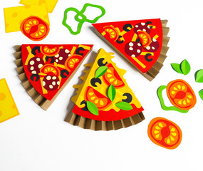 Pizza made of paper. Fast food.