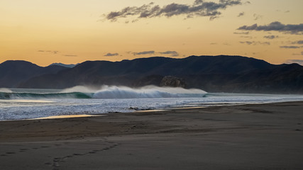 Beautiful aerial view of a sunset in  Naranjo Beach - Witch Rock Costa Rica