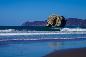 Beautiful aerial view of a sunset in  Naranjo Beach - Witch Rock Costa Rica