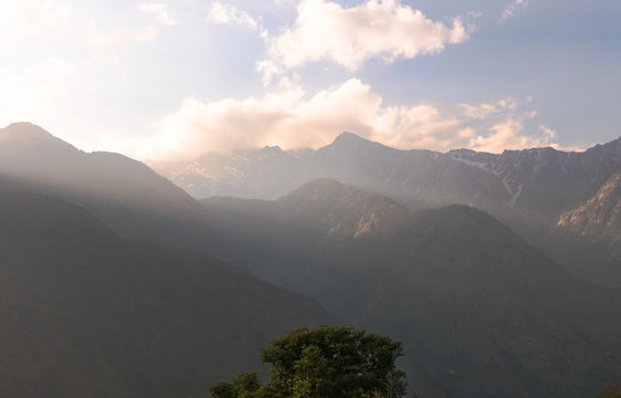 Sunset on the snowy mountains in Himalayas