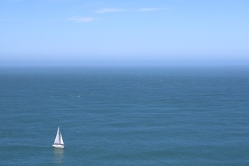Fototapeta premium Yacht on waters near Golden Gate Bridge, San Francisco