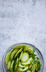 Green fresh zucchini slices salad. Vegan, vegetarian healthy food. Space for text