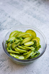 Green fresh zucchini slices salad. Vegan, vegetarian healthy food. Close up