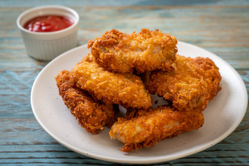 fried chicken wings with ketchup