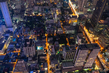 Fototapeta premium BANGKOK, THAILAND, December 25, 2019: Beautiful aerial view photo panoramic skyline of Bangkok at night from King Power Mahanakhon, Bangkok, Thailand (series)