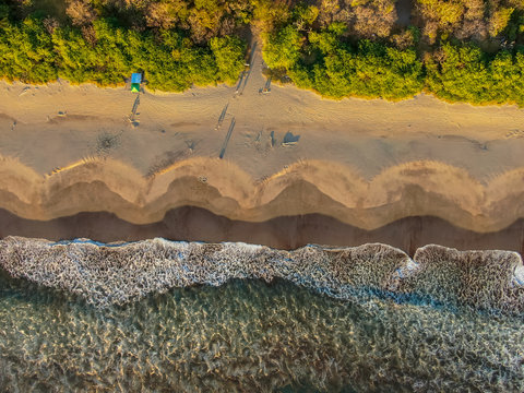 Beautiful aerial view of a sunset in  Naranjo Beach - Witch Rock Costa Rica