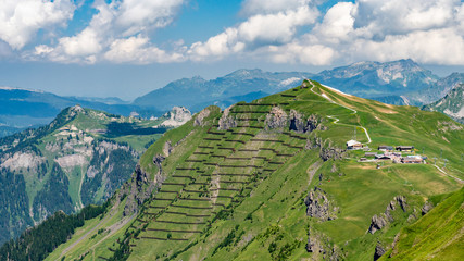 Switzerland, Panoramic view on Berghaus Männlichen and green Alps around 