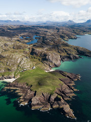 view of the sea and mountains from arial view
