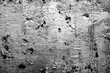 Obraz premium Texture of a concrete wall with cracks and scratches which can be used as a background