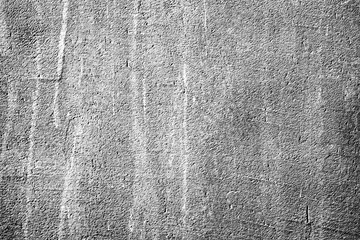 Texture of a metal wall with cracks and scratches which can be used as a background
