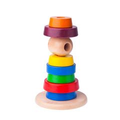 Toy or baby toy wood color pyramid on background new.