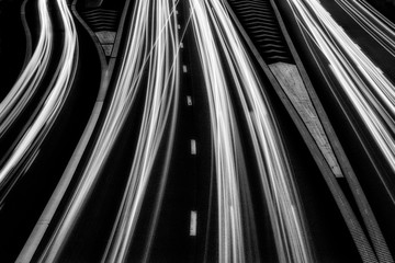 Light streams on a black highway