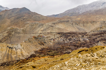 Kali Gandaki river valley with the old tibetan Purang and Jhong (Dzong) villages in cloudy winter day. Annapurna circuit trek, Nepal.
