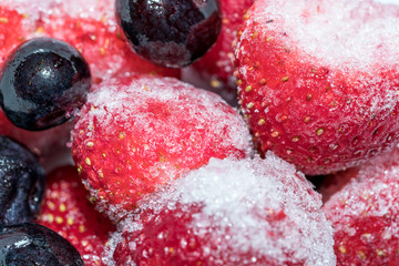 Frozen Berries - Strawberries & Blueberries Cold with Ice, Close up Macro