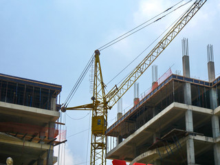 Concrete building under construction. Construction site. Industrial background.