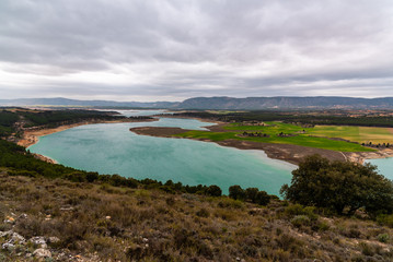 Fototapeta na wymiar Buendia reservoir with turquoise waters in spring, Spain