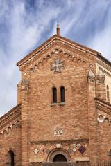 Fototapeta na wymiar Bologna, Basilica of Santo Stefano or the Seven Churches, closeup of the facade of the Basilica of Saints Vitale and Agricola. Emilia-Romagna, Italy, Europe