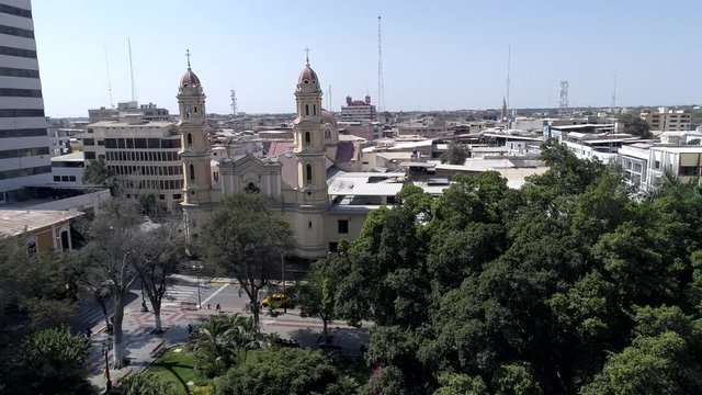 Forward aerial drone view move of the Cathedral of Piura at a sunny afternoon in Piura Region, Peru