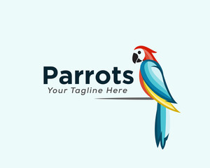 Colorful parrot is sitting on the branch logo design inspiration