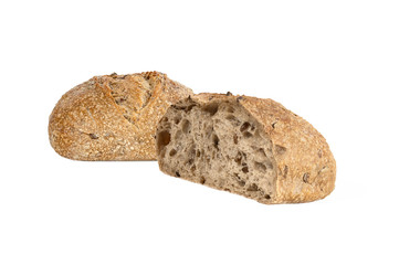 round wheat bread with various seeds and nuts isolated on white background. Whole and half