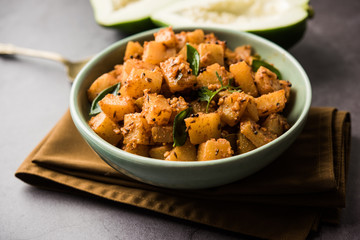 Kaccha Papita Sabji or Raw Papaya Sabzi, served in a karahi or bowl. selective focus