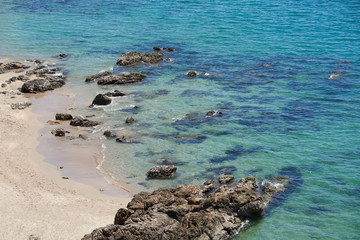 High angle view of beautiful beach and rocks
