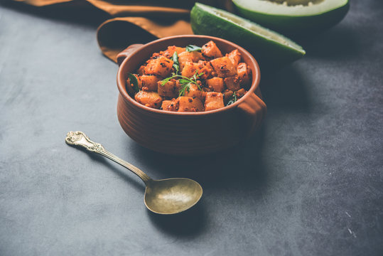 Kaccha Papita Sabji or Raw Papaya Sabzi, served in a karahi or bowl. selective focus