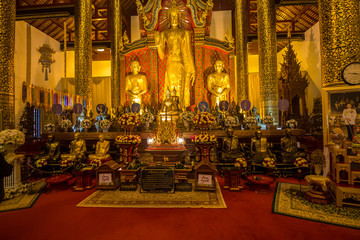 Fototapeta na wymiar Thai Temple Interior gold statues