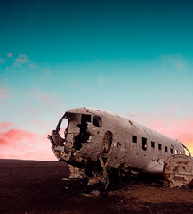 Plane wreckage with sunset in Iceland