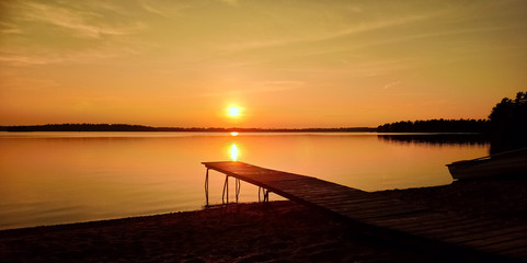 Fototapeta na wymiar Wonderful sunset over a lake in the North