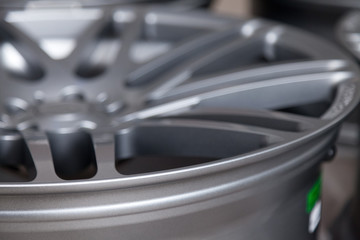 Beautiful alloy car wheels in forged aluminum with knitting needles and titanium silver. Auto...