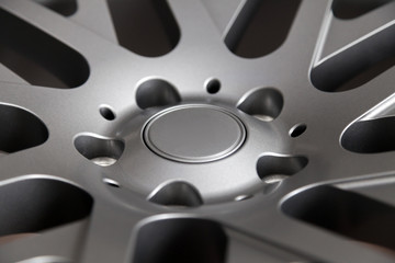 Beautiful alloy car wheels in forged aluminum with knitting needles and titanium silver. Auto...