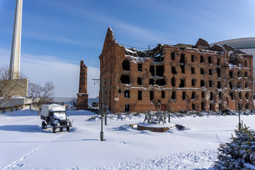 Volgograd. Russia-February 17, 2017. museum complex in Volgograd. The destroyed Gergardt mill and a copy of the monument-fountain "Barmaley", a German car next to the mill in Volgograd on the panorama