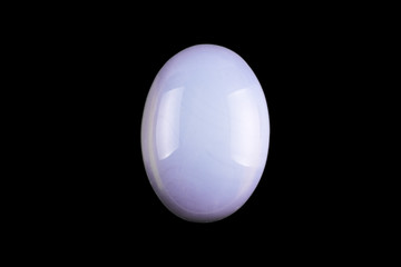 Cabochons made of natural stone on a black background