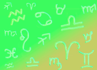 Astrological symbols on a green background
