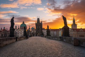 Spectacular sunrise over Charles Bridge at Prague