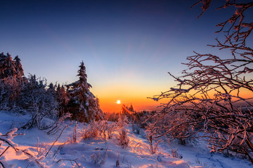 sunset in the mountains...Winter landscape in Germany, with snow and ice.  beautiful view from...