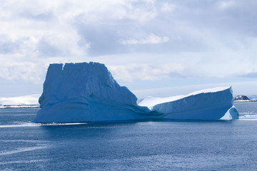 Obraz na płótnie Canvas A big iceberg along the coasts of the Anvers Island in the Antarctic Peninsula, Antarctica