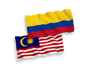 Flags of Colombia and Malaysia on a white background