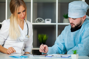 Doctor checks the health of the patient in the clinic.