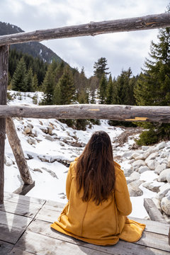 Woman In Winter Snow Forest. Girl Walking In Fur Coat, With Snowy White Background. Winter Scene, With White Snowflakes. Shot In Ski Resort, Bansko Bulgaria. Snowboarding Recreation